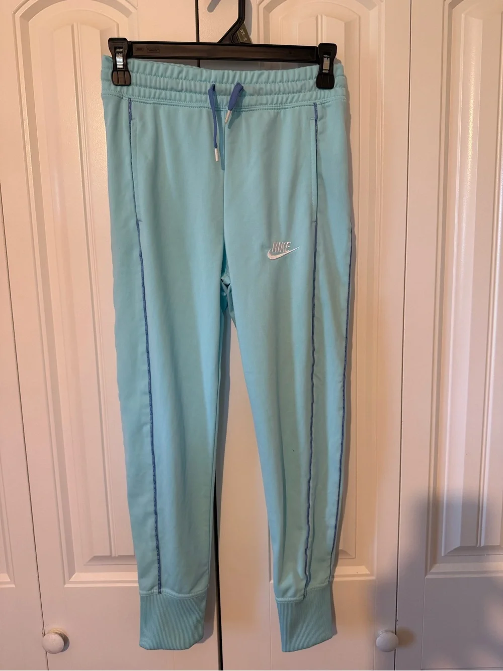 Nike Kids light teal blue Joggers with Blue Piping